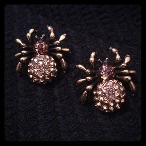 Eerie pierced spider earrings! Boo!